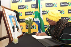 Dr Nkosazana Dlamini-Zuma signing the book of condolences at the SA embassy