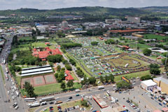 People waiting in line at Tshwane Events Centre to be transported to the Union Buildings